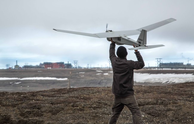 Unmanned Aerial System technology using an AeroVironment Puma drone is given a preflight inspection in preparation for flights by BP at its Prudhoe Bay, Alaska, June 7.   AP-Yonhap