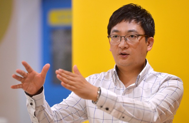 Bahn Woo-roung, head of the Red Devils, the nation’s largest football fan club, speaks in a recent interview in Seoul. (Lee Sang-sub/The Korea Herald)