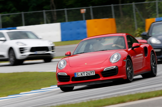 Porsche cars are test-driven on the Everland Speedway in Yongin, Gyeonggi Province, Wednesday.   Porsche Korea