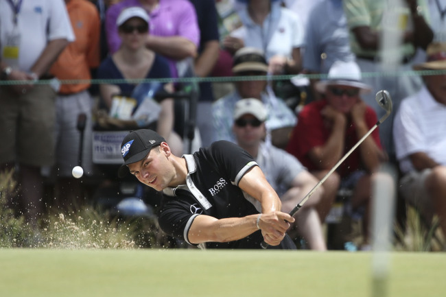 Martin Kaymer hits from the bunker on the sixth hole at the U.S. Open on Saturday.   USA Today-Yonhap