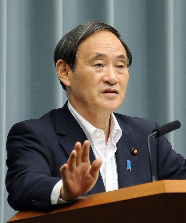 Japanese Chief Cabinet Secretary Yoshihide Suga speaks at a press conference at the prime minister's official residence in Tokyo on Friday. (AFP-Yonhap)