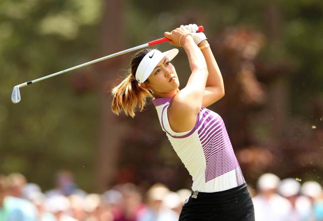 Michelle Wie tees off on the ninth hole at the U.S. Women’s Open on Saturday.   AFP-Yonhap