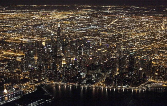 A night aerial view of the downtown Chicago skyline in 2013.   AP-Yonhap
