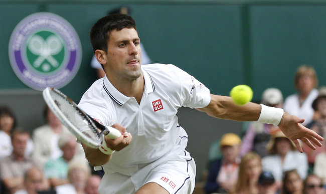 Novak Djokovic returns the ball to Radek Stepanek during the All England Lawn Tennis Championships in Wimbledon, London, Wednesday.   AP-Yonhap