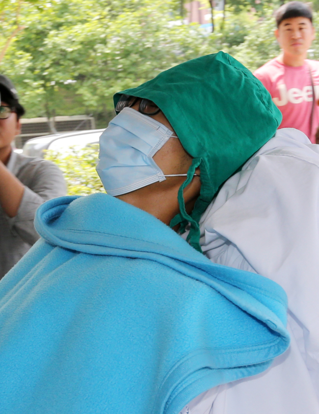 The sergeant being held for his role in a shooting spree   Yonhap