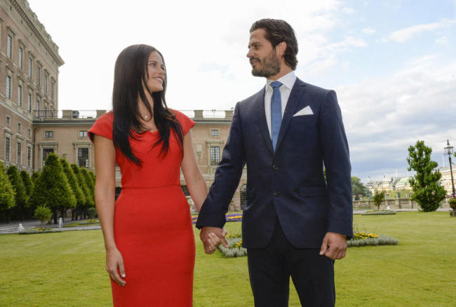 Swedish Prince Carl Philip (right) and Sofia Hellqvist announce their engagement at a press conference at The Stockholm Palace in Stockholm on Friday.   AP