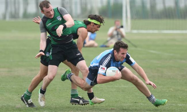 Seoul Gaels players (in green) vie for the ball with Shanghai Gaelic Football Club players at the All-China Gaelic Games in Shanghai in June.   Seoul Gaels