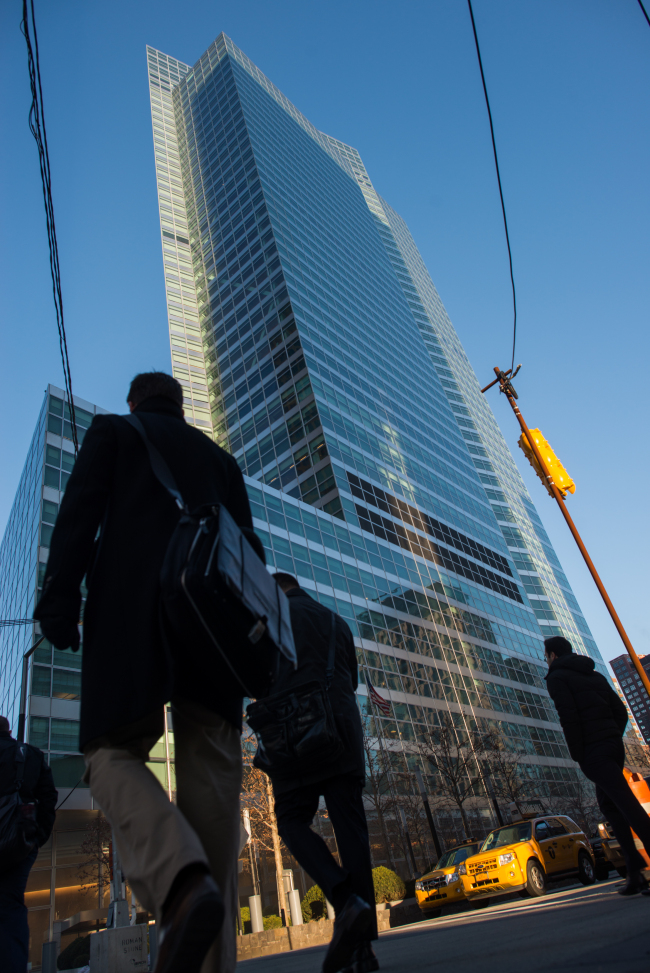 People walk outside Goldman Sachs’ headquarters in New York.   Bloomberg