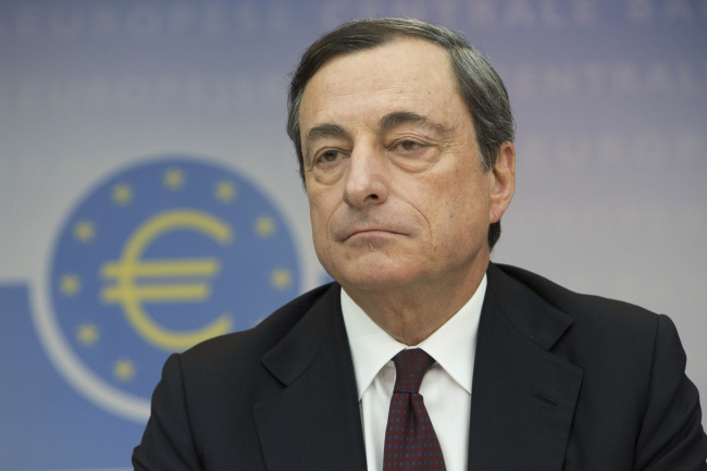 ECB chief Mario Draghi takes part in a news conference in Frankfurt, Germany, Thursday.   Bloomberg