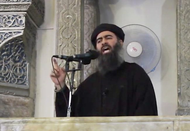 This image taken from video posted on a militant website Saturday purports to show the leader of the Islamic State group, Abu Bakr al-Baghdadi, delivering a sermon at a mosque in Iraq.   AP-Yonhap