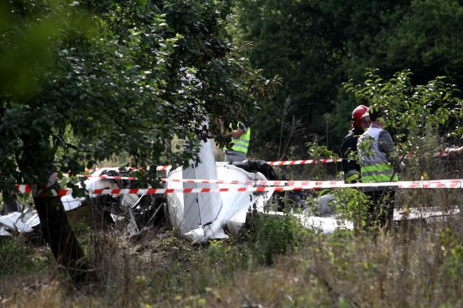 The wreck of a plane is pictured after an accident in Topolow near Czestochowa, Poland, Saturday.   AFP-Yonhap