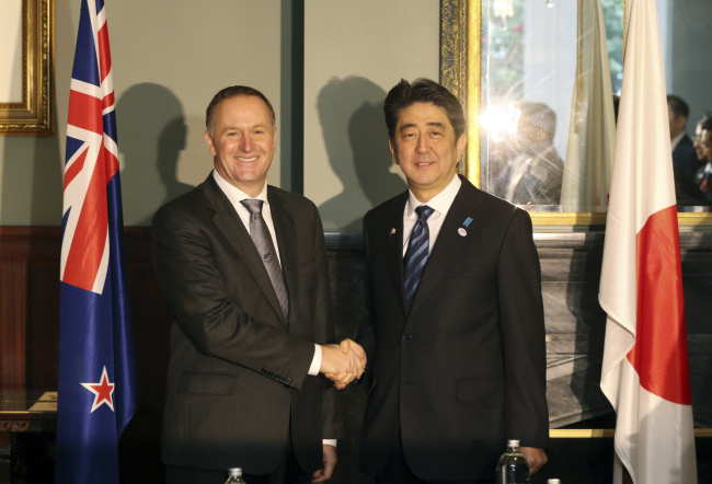New Zealand’s Prime Minister John Key (left) meets with Japan’s Prime Minister Shinzo Abe at Government House in Auckland on Monday.   AP-Yonhap