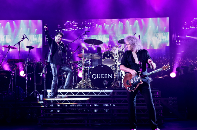Adam Lambert (left) and members of the rock band Queen. 9ENT