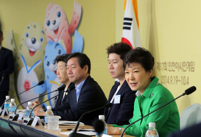 President Park Geun-hye speaks at a meeting to check preparation of the 17th Asian Games Incheon 2014 at Incheon Asiad Main Stadium on Friday.   Yonhap