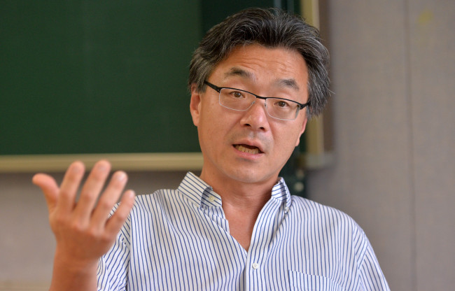 John Lie speaks during an interview with The Korea Herald at Kyung Hee University. Lee Sang-sub/The Korea Herald