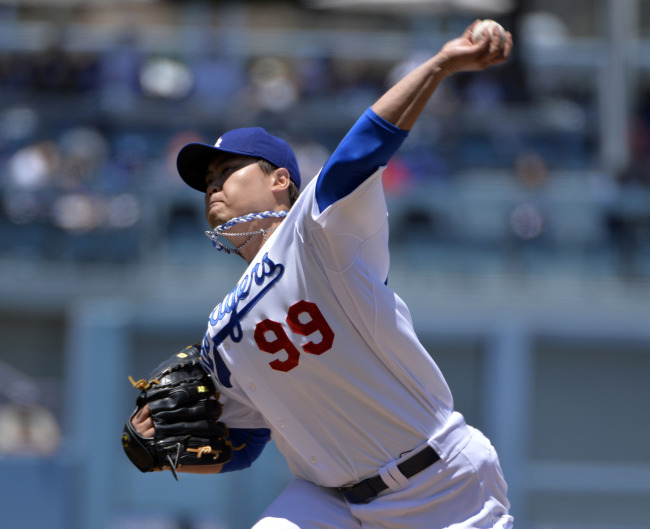 Los Angeles Dodgers starting pitcher Ryu Hyun-jin throws in the first inning against the San Diego Padres at Dodger Stadium.   AP-Yonhap