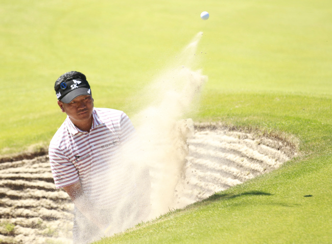 Korea’s Choi Kyung-ju plays a bunker shot on the 15th hole during a practice round ahead of the British Open on Tuesday.   AP-Yonhap