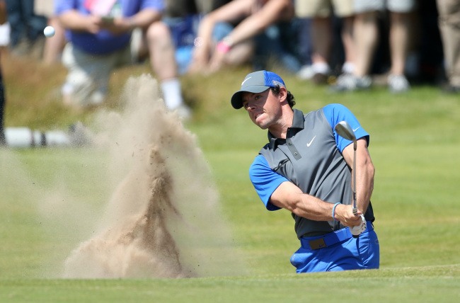 Rory McIlroy plays a shot on the 16th hole on Thursday.   AP-Yonhap