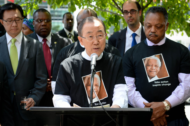 United Nations Secretary-General Ban Ki-moon (center) speaks during a ceremony commemorating Nelson Mandela International Day, in front of the U.N. headquarters in New York on Friday.   Xinhua-Yonhap