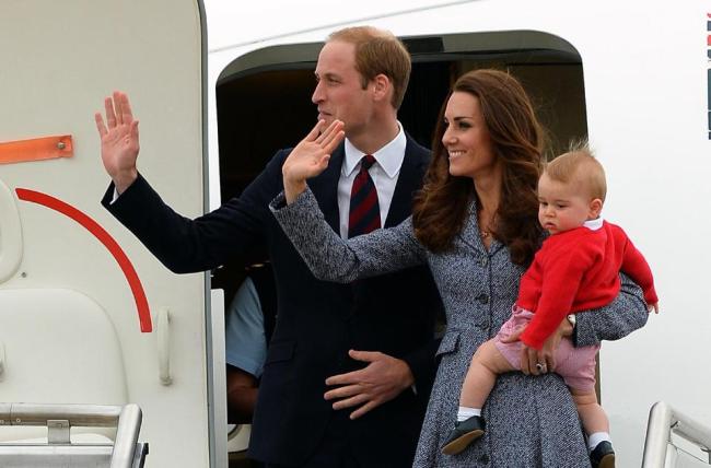 Britain’s Prince William (left), wife Catherine and their son Prince George depart from Canberra, Australia, April 25.   AFP-Yonhap