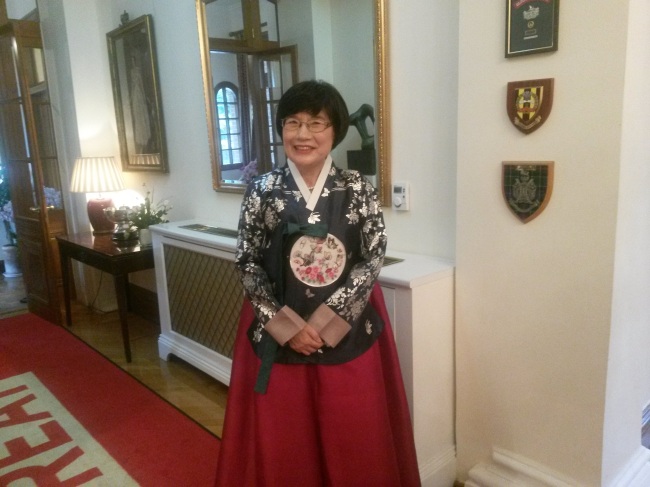 Chung Hee-sun, dean of the Graduate School of Analytical Science and Technology at Chungnam National University, poses during a reception to name her Commander of the Order of the British Empire by British Ambassador to South Korea Scott Wightman at his residence in Seoul, July 9.   Philip Iglauer/The Korea Herald