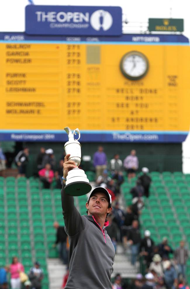 Northern Ireland’s Rory McIlroy celebrates with the claret jug after winning the British Open on Sunday.   AFP-Yonhap