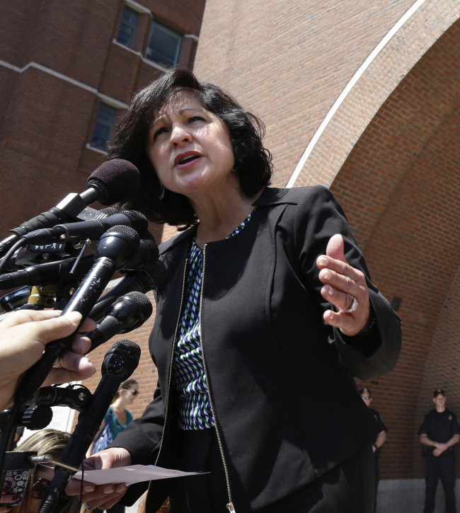 U.S. Attorney for the District of Massachusetts Carmen Ortiz speaks to reporters outside the federal court in Boston on Monday.   AP-Yonhap