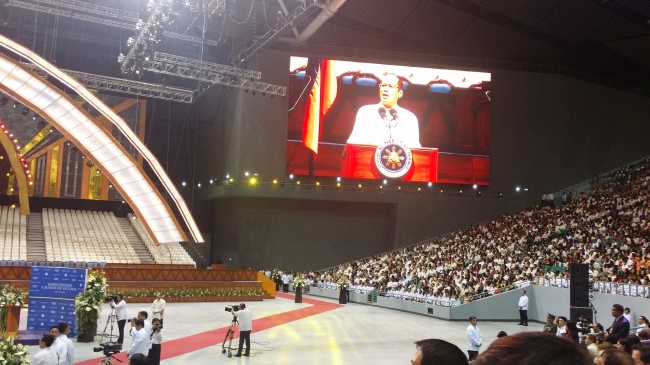 Philippines President Benigno Simeon Cojuangco Aquino III (on screen) on Monday delivers a congratulatory speech during a ceremony celebrating the completion of the Philippines Arena built by Hanwha Engineering & Construction.   Hanwha E&C