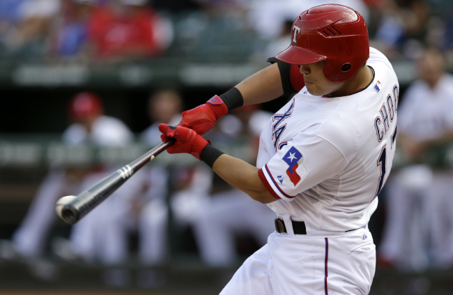 Texas Rangers DH Choo Shin-soo singles in the first inning on Sunday.   AP-Yonhap
