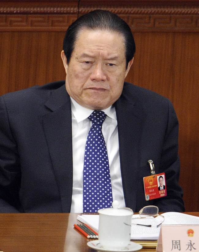 China’s then-Politburo Standing Committee Member Zhou Yongkang (front) during a plenary session of the National People’s Congress at the Great Hall of the People in Beijing on March 11, 2011. AFP-Yonhap