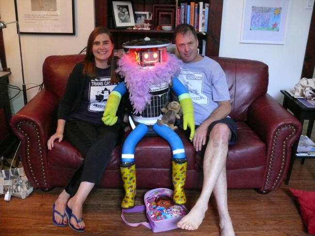 Creators Dr. Frauke Zeller (left) of Ryerson University and Dr. David Harris Smith of McMaster University pose with hitchBOT.   AFP