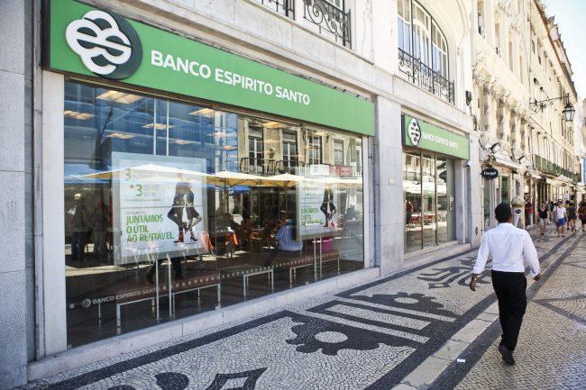 A man passing a Banco Espirito Santo branch in Lisbon.   EPA-Yonhap