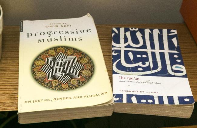American Muslim Omar Akersim’s book “Progressive Muslims” is shown next to the Quran at his home in Los Angeles. (AP)