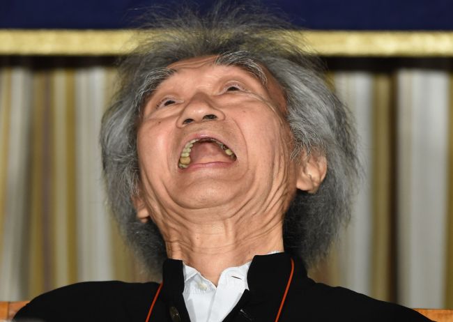 Japanese conductor Seiji Ozawa laughs while attending the FCC luncheon in Tokyo on Monday. (AFP-Yonhap)