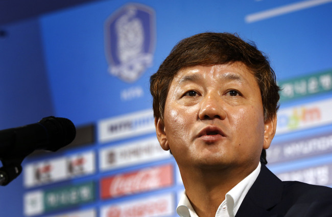 Korea head coach Lee Kwang-jong speaks during a press conference in Seoul on Thursday.   Yonhap