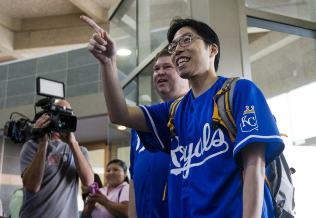Lee Sung-woo reacts as he arrives at Kansas City International Airport on Aug. 5.   AP