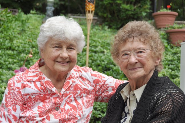 Dorothy Hutchins (left) of Towson, Maryland, spends time with Charlotte Rollenhagen on Aug. 11 after reuniting the
day before. The women met at Johns Hopkins Hospital in 1940, when Hutchins was a 10-year-old girl who had
burned her back in a kitchen accident and Rollenhagen was her young nurse. (MCT)