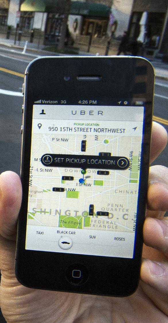 Uber’s app   AFP-Yonhap
Uber teamed up with dining and travel smartphone applications Wednesday as the controversial Internet-age car-hailing service moved to park itself at the heart of mobile lifestyles.
The San Francisco-based start-up let about a dozen businesses such as Starbucks, Hyatt Hotels, United Airlines, TripAdvisor and restaurant reservation service OpenTable make it simple for people to summon Uber cars from inside their applications for smartphones or tablet computers.