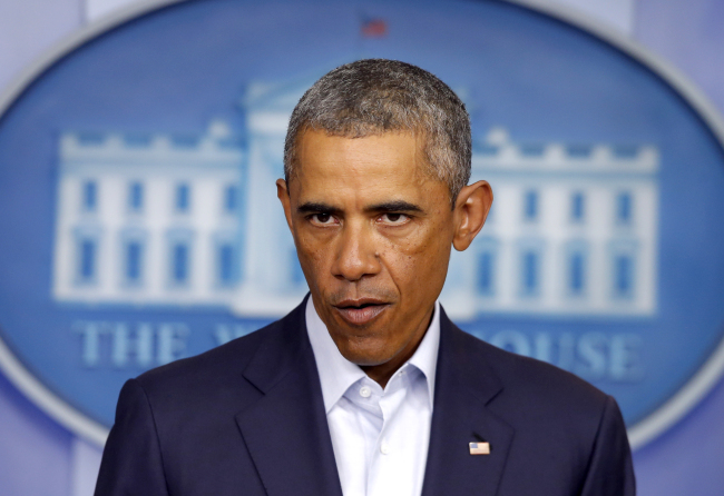 <YONHAP PHOTO-0102> President Barack Obama speaks in the James Brady Press Briefing Room of the White House in Washington, Monday, Aug. 18, 2014. Taking a two-day break from summer vacation, President Barack Obama met with top advisers at the White House Monday to review developments in Iraq and in racially charged Ferguson, Mo., two trouble spots where Obama has ordered his administration to intervene. (AP Photo/Charles Dharapak)/2014-08-19 05:39:34/ <저작권자 ⓒ 1980-2014 ㈜연합뉴스. 무단 전재 재배포 금지.>
U.S. President Barack Obama