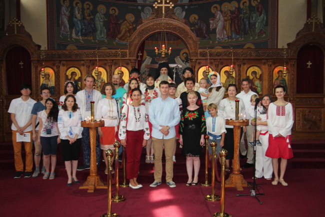 Metropolitan Ambrose-Aristotle Zographos of the Korean Orthodox Church (center, back row) poses for a photo with officials from the Ukrainian Embassy, expatriates and supporters after delivering a special service for a Ukrainian Independence Day event at St. Nicholas Church in Seoul on Aug. 24. (Ukrainian Embassy)