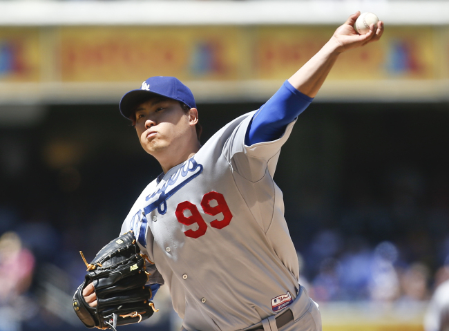 Los Angeles Dodgers starting pitcher Ryu Hyun-jin delivers in the first inning on Sunday.   AP-Yonhap