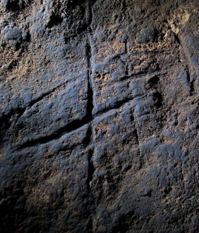 A Neanderthal rock engraving at Gorham’s Cave in Gibraltar   AP-Yonhap