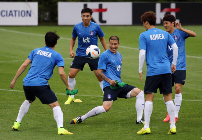 The Korean national soccer team takes part in a practice session ahead of its friendly against Venezuela.   Yonhap