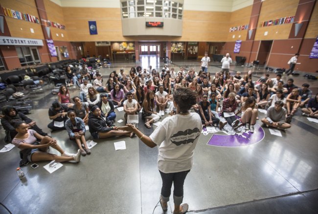 up a day of training, Sarah Antoncich, a Garfield High faculty member, ends the session with the juniors and seniors who will be starting school next week. (MCT)