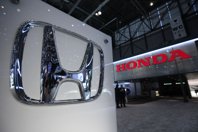 The Honda Motor logo is seen on the company’s stand during the Geneva International Motor Show in Geneva, Switzerland.   Bloomberg