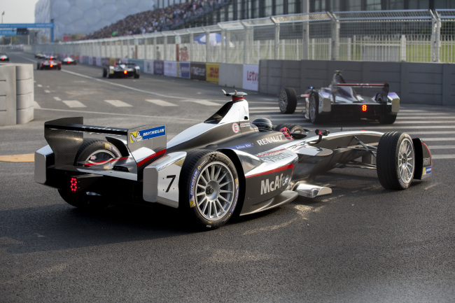 Renault SA signage is displayed on an e.dams-Renault Formula E race car during the FIA Formula E 2014 Beijing ePrix at the Beijing Olympic Green Circuit in Beijing on Saturday.   Bloomberg