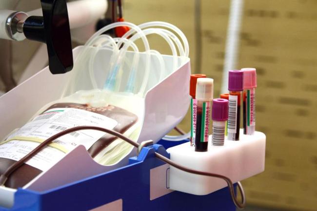A blood bag and test tubes filled with blood at a hospital in Paris   AFP-Yonhap