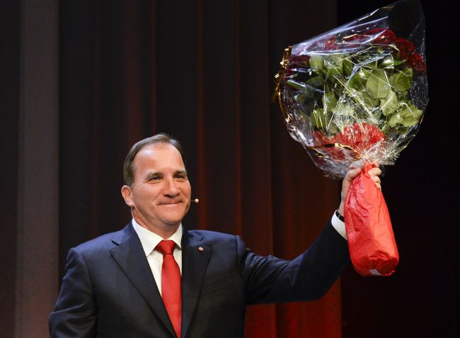 Social Democratic Party leader Stefan Loefven waves to supporters after his address at an election night party following general election results in Stockholm on Sunday.   AFP-Yonhap