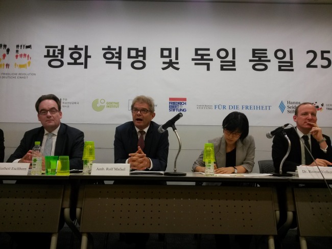 German Ambassador Rolf Mafael (second from left) speaks during the opening of a panel discussion, titled “Peaceful Revolution and German Unification,” at the European nation’s new chancery in Seoul on Tuesday. (Philip Iglauer/The Korea Herald)