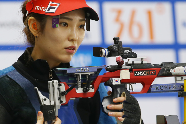 Korea’s Jeong Mi-ra competes in the women’s rifle three-position event on Friday.   Yonhap